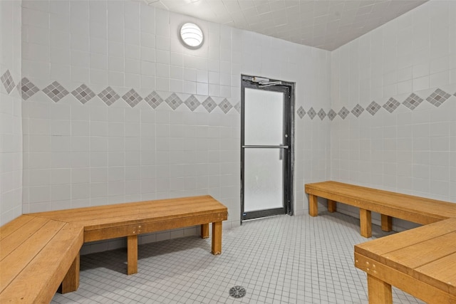 33 Broken Lance Dr Unit 207S, Breckenridge, CO 80424 - bathroom with tile walls and tile patterned flooring