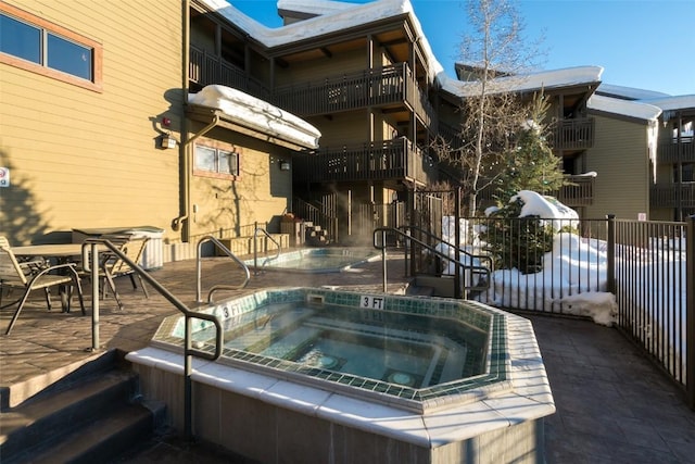 2700 Village Dr Unit B102, Steamboat Springs, CO 80487 - view of home's community with a jacuzzi and a patio area