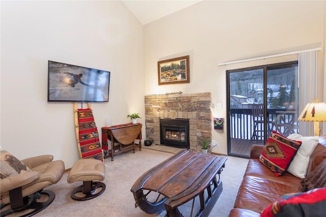 living room with a fireplace, carpet floors, and high vaulted ceiling