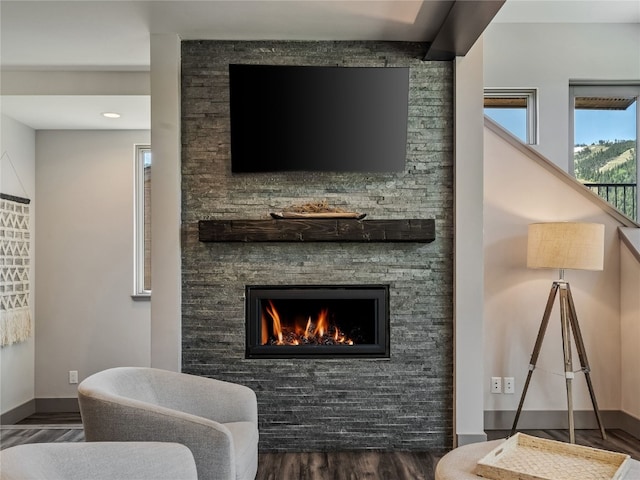 184 Caravelle Dr Unit 20, Keystone, CO 80435 - living room featuring wood finished floors, a stone fireplace, and recessed lighting