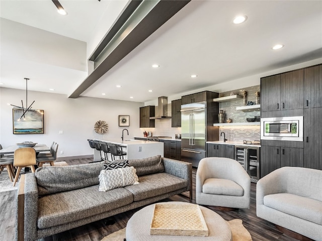 184 Caravelle Dr Unit 20, Keystone, CO 80435 - living area with wine cooler, bar with sink, recessed lighting, and dark wood finished floors