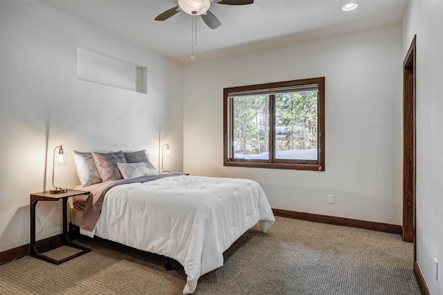 120 Windwood Cir, Breckenridge, CO 80424 - carpeted bedroom with a ceiling fan and baseboards
