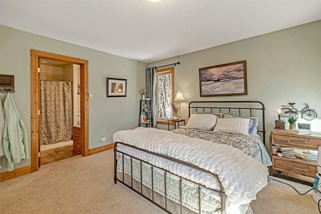 bedroom featuring baseboards and light carpet