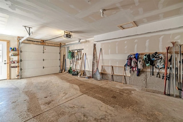 garage featuring a garage door opener