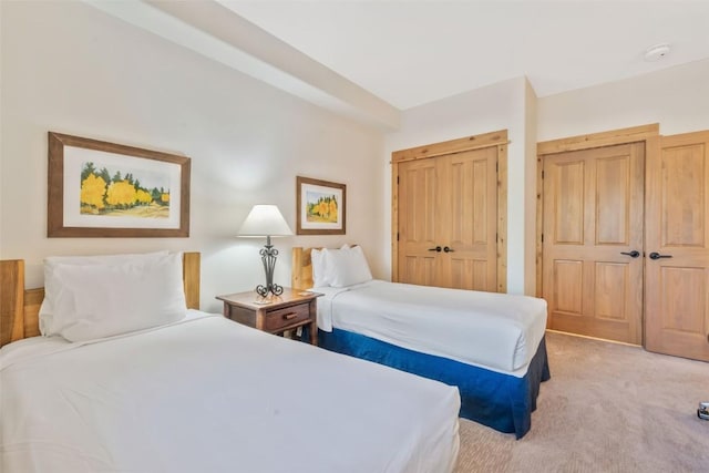 bedroom with light carpet