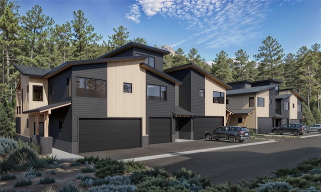 exterior space with driveway and a garage