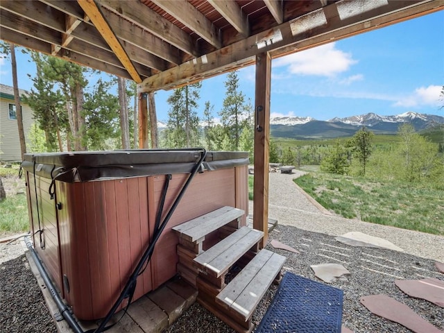 511 Fairview Blvd, Breckenridge, CO 80424 - view of patio / terrace with a hot tub and a mountain view
