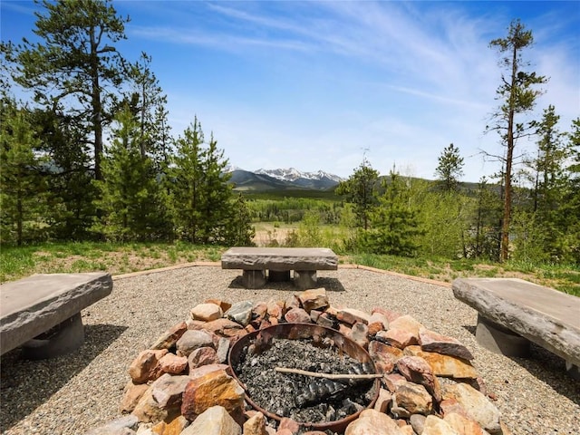 511 Fairview Blvd, Breckenridge, CO 80424 - view of patio / terrace with a fire pit and a mountain view