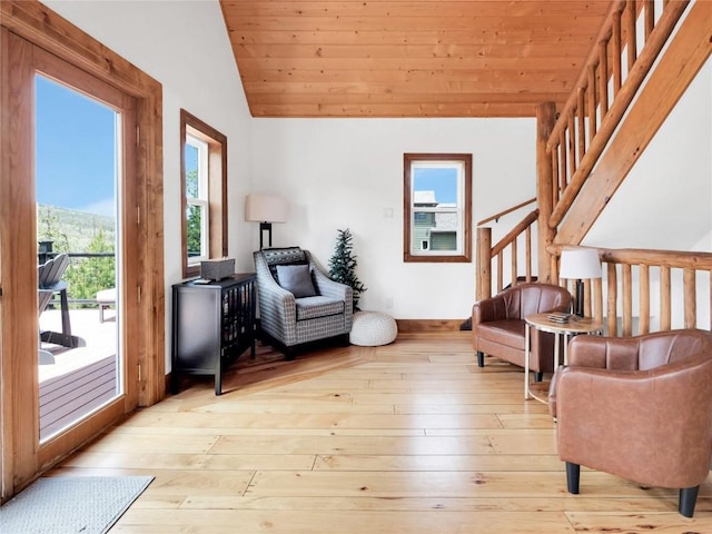 511 Fairview Blvd, Breckenridge, CO 80424 - living area with vaulted ceiling, wood-type flooring, wood ceiling, and stairs