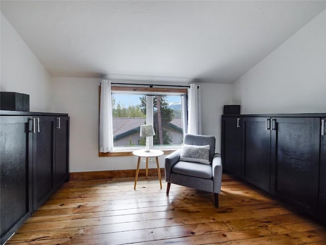 511 Fairview Blvd, Breckenridge, CO 80424 - sitting room featuring vaulted ceiling and light wood-style floors