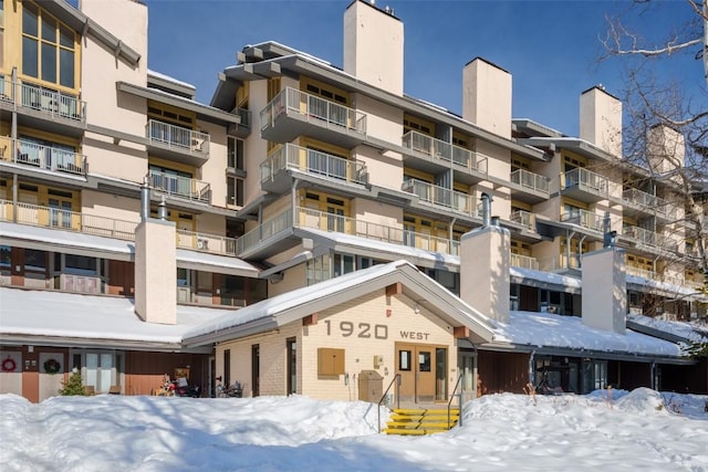 view of snow covered property