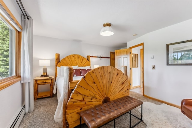 1375 Roberts Rd, Alma, CO 80440 - bedroom featuring a baseboard radiator, light carpet, and multiple windows