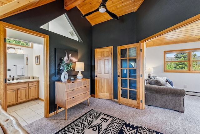 1375 Roberts Rd, Alma, CO 80440 - bedroom featuring a wooden ceiling with exposed beams, ensuite bath, high vaulted ceiling, light carpet, and baseboard heating