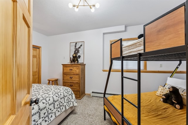 1375 Roberts Rd, Alma, CO 80440 - bedroom featuring light carpet, a baseboard heating unit, and a chandelier
