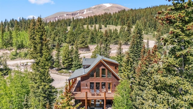 1375 Roberts Rd, Alma, CO 80440 - rear view of property featuring a wooded view and a mountain view