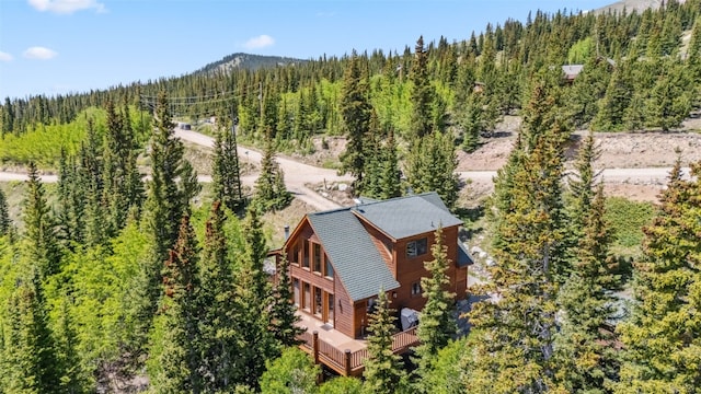 1375 Roberts Rd, Alma, CO 80440 - view of subject property featuring a forest and mountains