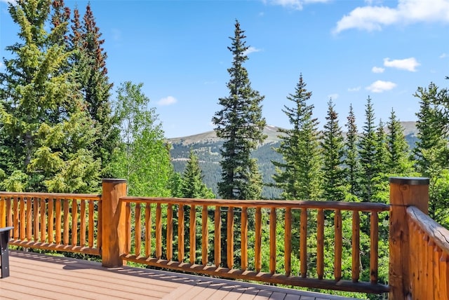 1375 Roberts Rd, Alma, CO 80440 - wooden terrace featuring a mountain view and a wooded view