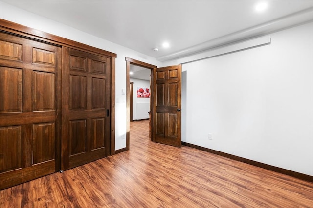 26395 County Road 33a, Steamboat Springs, CO 80487 - unfurnished bedroom with wood finished floors and baseboards