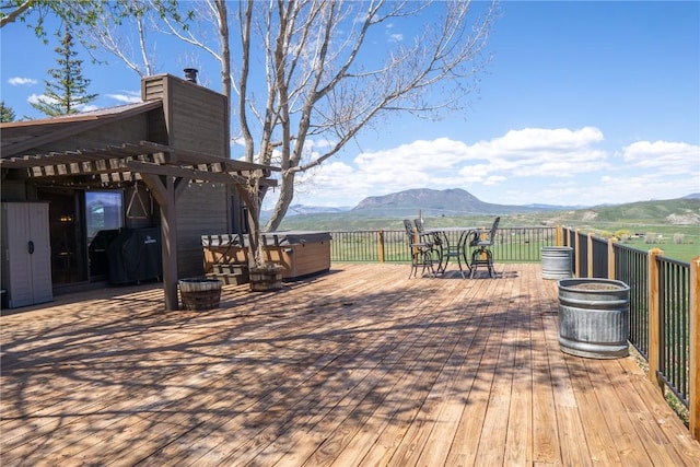 26395 County Road 33a, Steamboat Springs, CO 80487 - wooden terrace with a hot tub and a mountain view