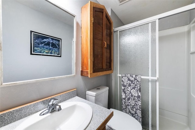 26395 County Road 33a, Steamboat Springs, CO 80487 - full bath featuring toilet, a stall shower, and vanity