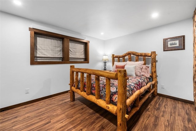26395 County Road 33a, Steamboat Springs, CO 80487 - bedroom with baseboards, wood finished floors, and recessed lighting