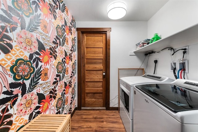 26395 County Road 33a, Steamboat Springs, CO 80487 - clothes washing area featuring washer and dryer, wood finished floors, and baseboards