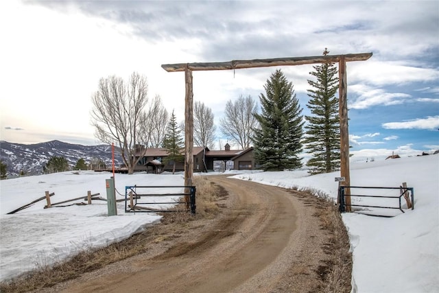 26395 County Road 33a, Steamboat Springs, CO 80487 - view of dirt / gravel road featuring a gated entry and a mountain view