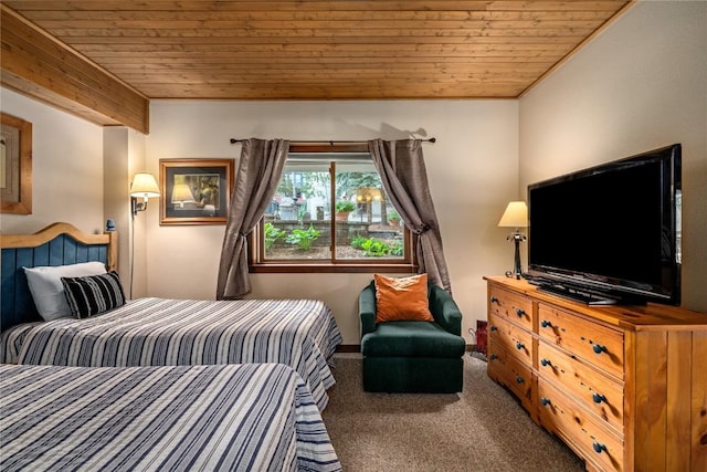 carpeted bedroom with wooden ceiling