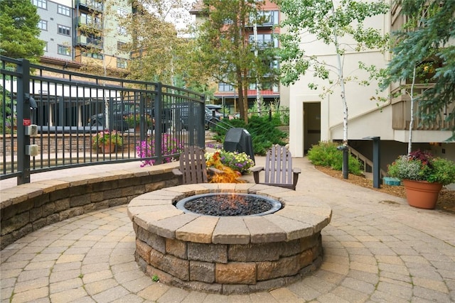 view of patio featuring a fire pit