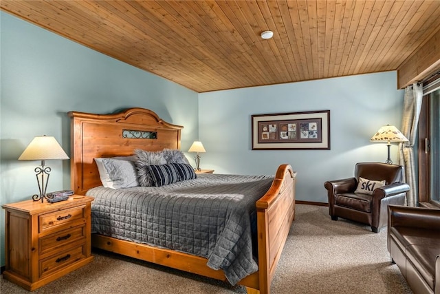 carpeted bedroom featuring wood ceiling