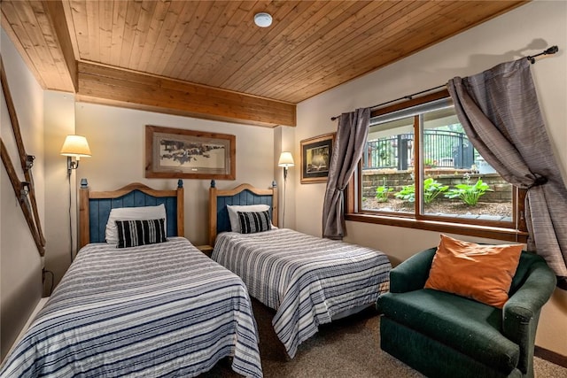 bedroom with carpet flooring and wooden ceiling