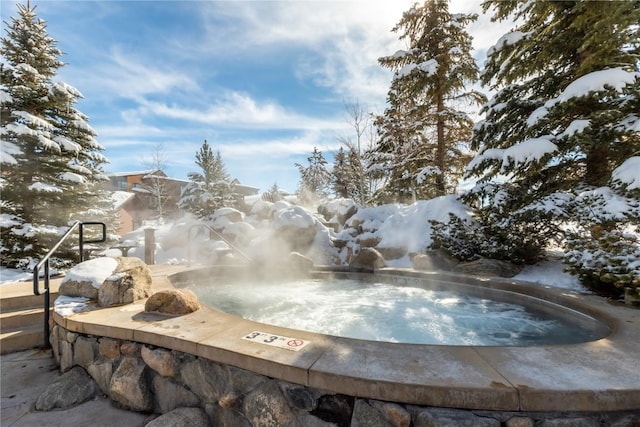 view of community with a jacuzzi