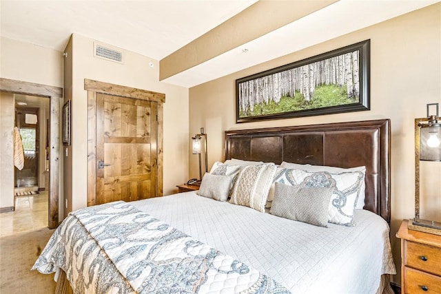 bedroom featuring visible vents