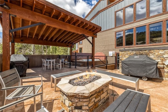 530 S French St Unit 110, Breckenridge, CO 80424 - view of patio / terrace with an outdoor fire pit, grilling area, and outdoor dining space