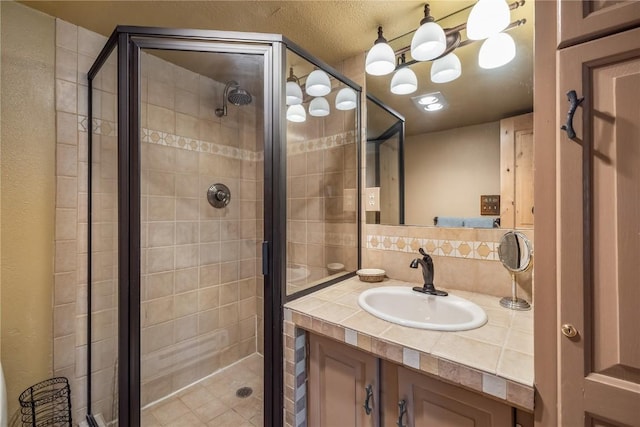 530 S French St Unit 110, Breckenridge, CO 80424 - full bath featuring a stall shower, backsplash, and vanity