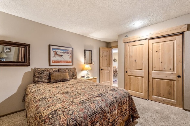 530 S French St Unit 110, Breckenridge, CO 80424 - bedroom with carpet flooring, a textured ceiling, and a closet