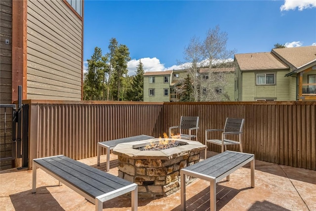 530 S French St Unit 110, Breckenridge, CO 80424 - view of patio / terrace featuring a fire pit and a residential view