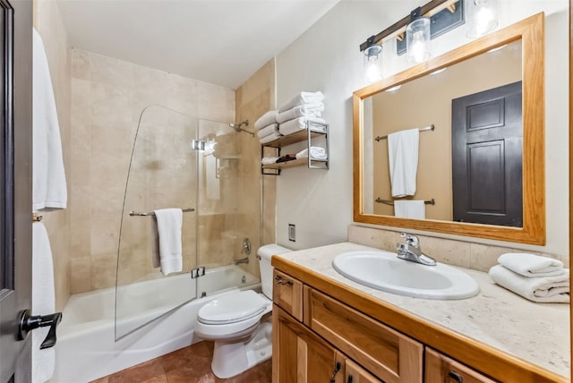 285 Davis Ct, Blue River, CO 80424 - full bathroom with toilet, vanity, bath / shower combo with glass door, and tile patterned flooring
