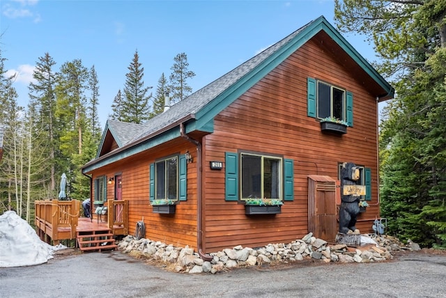 285 Davis Ct, Blue River, CO 80424 - view of property exterior with a wooden deck and a shingled roof
