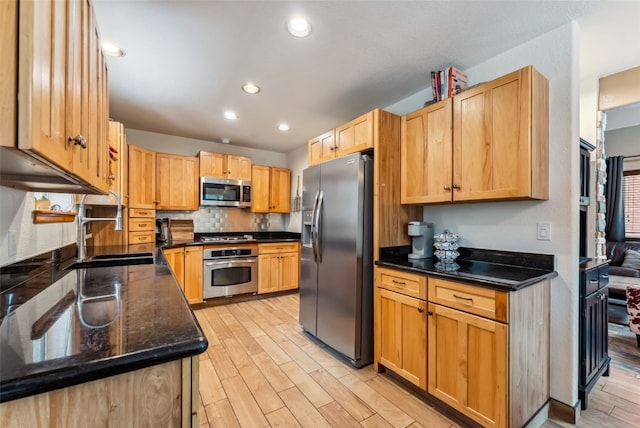 285 Davis Ct, Blue River, CO 80424 - kitchen featuring stainless steel appliances, a sink, light wood-style flooring, recessed lighting, and tasteful backsplash