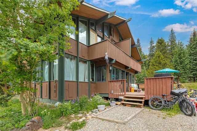 136 Lance Ln Unit 2, Breckenridge, CO 80424 - rear view of property featuring a balcony and a deck