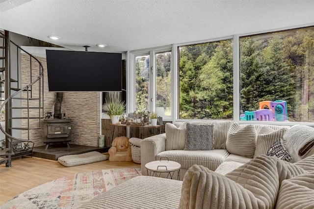 136 Lance Ln Unit 2, Breckenridge, CO 80424 - sunroom featuring a wood stove