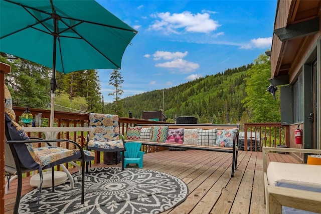 136 Lance Ln Unit 2, Breckenridge, CO 80424 - wooden deck featuring a forest view