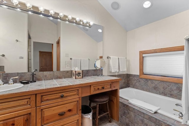 2743 Timber Ct Unit 3, Steamboat Springs, CO 80487 - full bathroom featuring lofted ceiling, a bath, and vanity