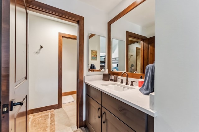 405 Village Rd Unit 405, Breckenridge, CO 80424 - bathroom featuring vanity and tile patterned flooring
