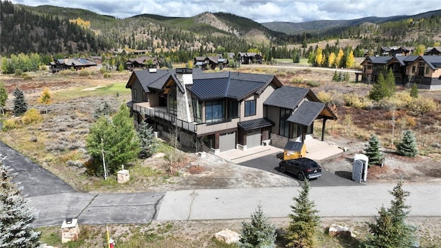 birds eye view of property featuring a residential view and a mountain view