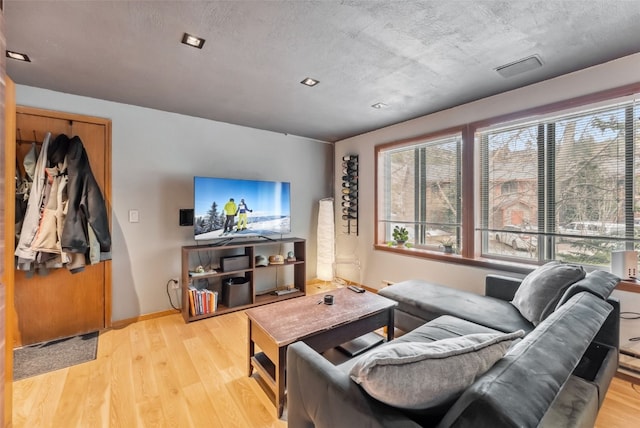 344 Illinois Gulch Rd Unit 201, Breckenridge, CO 80424 - living room with light wood-type flooring and baseboards