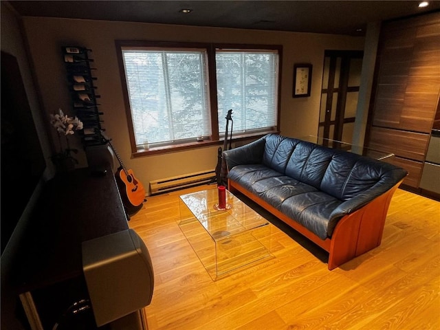 344 Illinois Gulch Rd Unit 201, Breckenridge, CO 80424 - living room with a baseboard radiator, light wood-style flooring, and recessed lighting