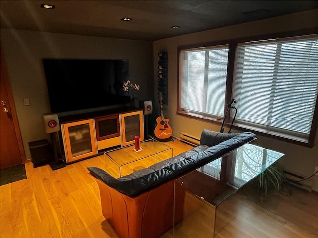 344 Illinois Gulch Rd Unit 201, Breckenridge, CO 80424 - living room with light wood-style floors, a baseboard heating unit, and recessed lighting