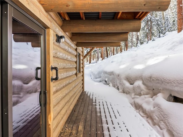 view of snow covered deck